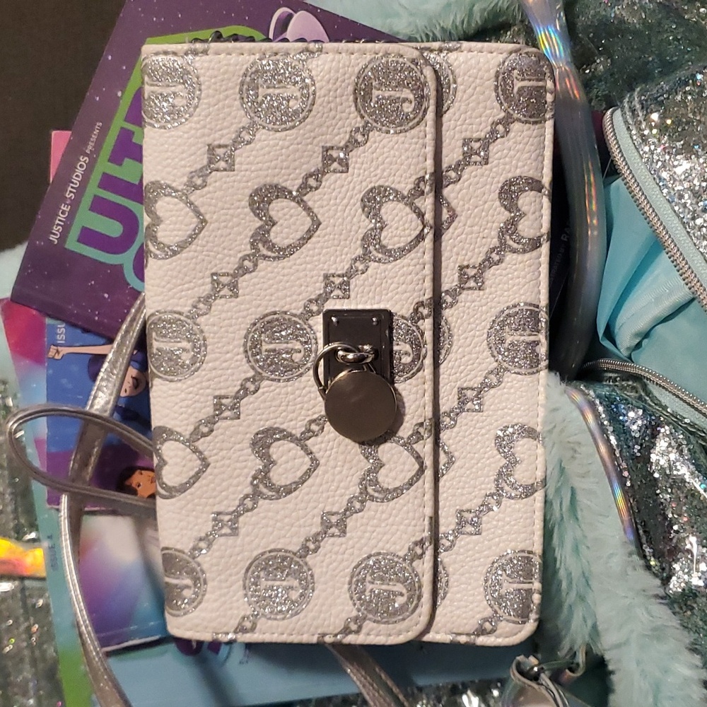 Justice suitcase, purse and books